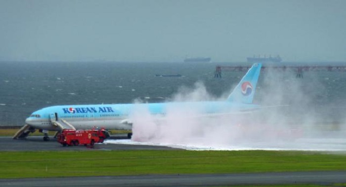 Korean Air evacuates plane at Japan`s Haneda airport after engine smoke